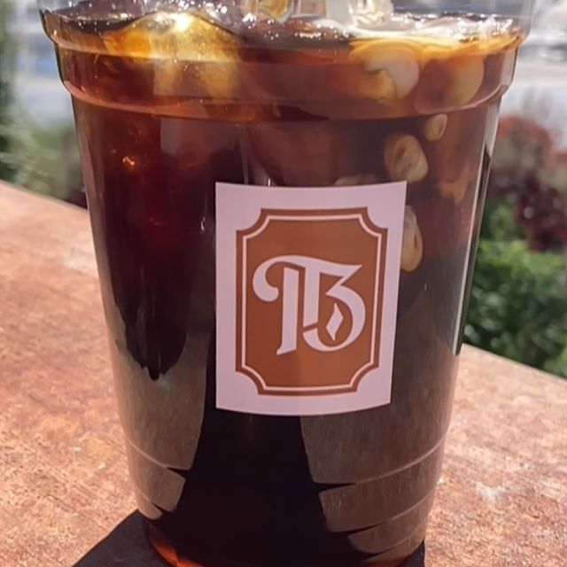 Iced coffee with cream in it